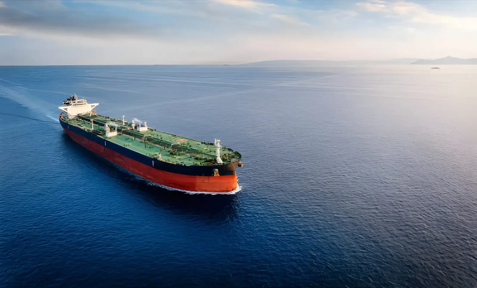 Crude oil tanker at sea, loaded for discharge at a JSF Logistics terminal
